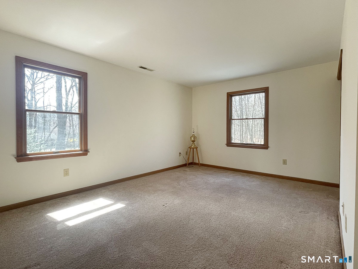 1315 Purchase Brook Road Southbury, CT 06488 - Photo 33 of 41 an empty room with windows