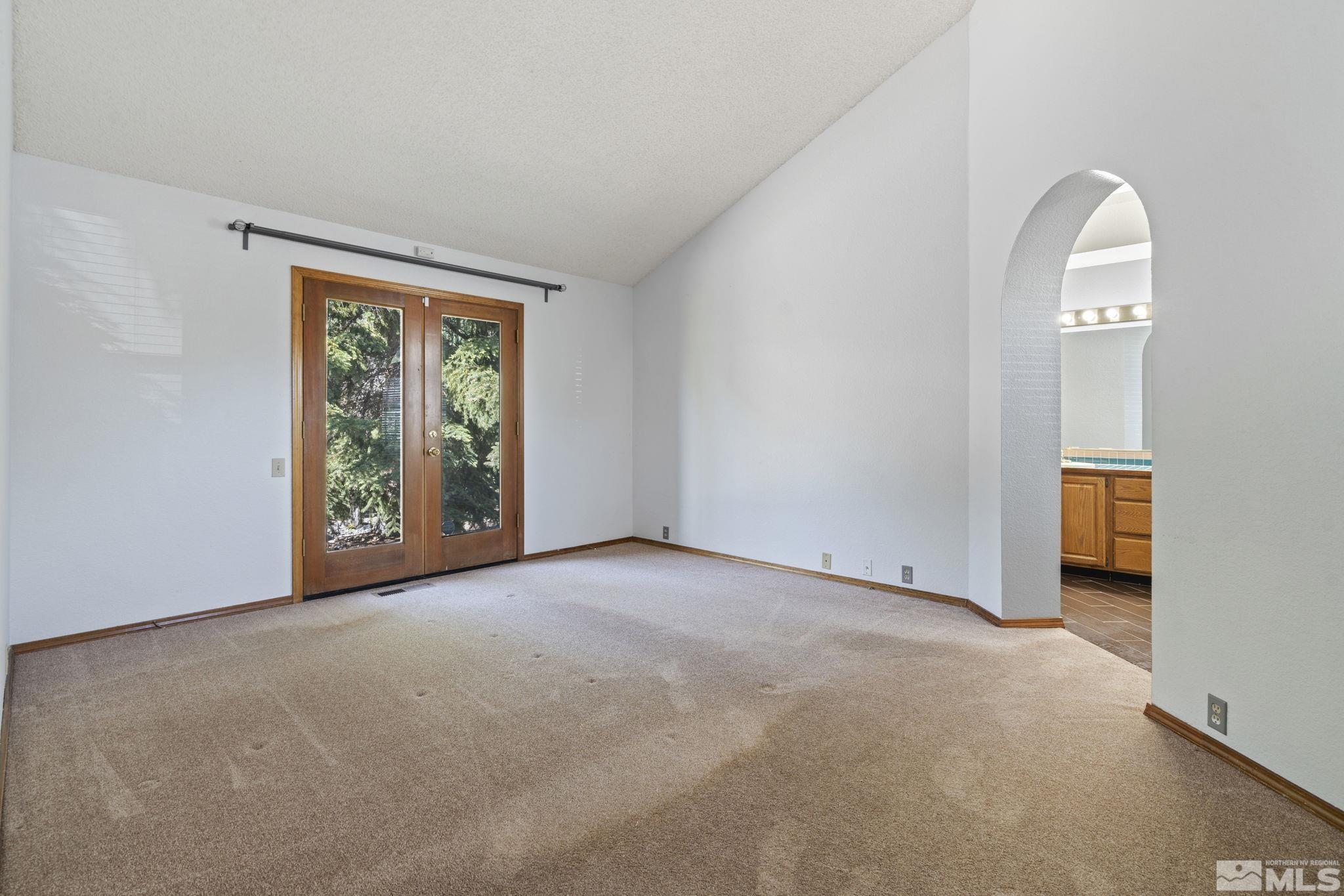14050 Riata Circle Reno, NV 89521 - Photo 13 of 33 an empty room with windows