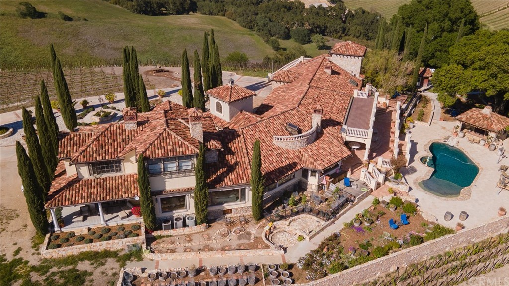 2380 Live Oak Road Paso Robles, CA 93446 - Photo 1 of 20 an aerial view of a house with a yard