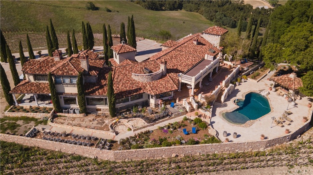 2380 Live Oak Road Paso Robles, CA 93446 - Photo 3 of 20 a view of a house with a yard and sitting area