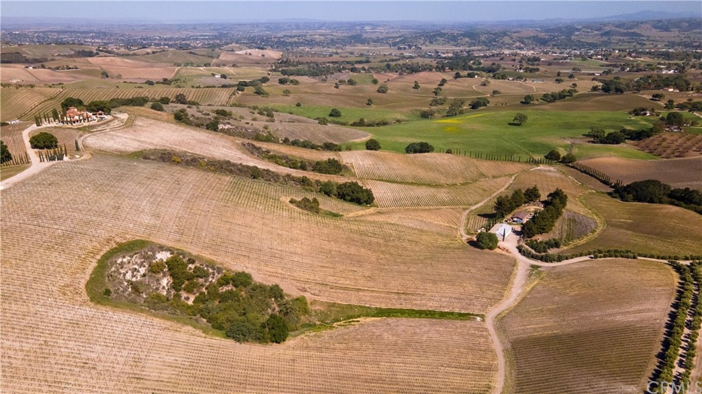 2380 Live Oak Road Paso Robles, CA 93446 - Photo 9 of 20 an aerial view of a house with a yard and lake view