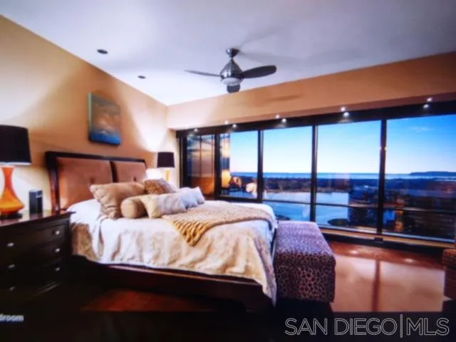 100 Harbor Drive, Unit 3404 San Diego, CA 92101 - Photo 18 of 30 a bed room with bed and window