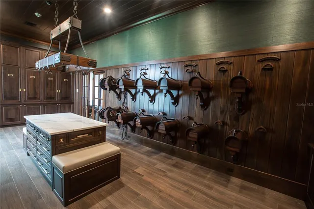 a outdoor space with lots of wooden furniture