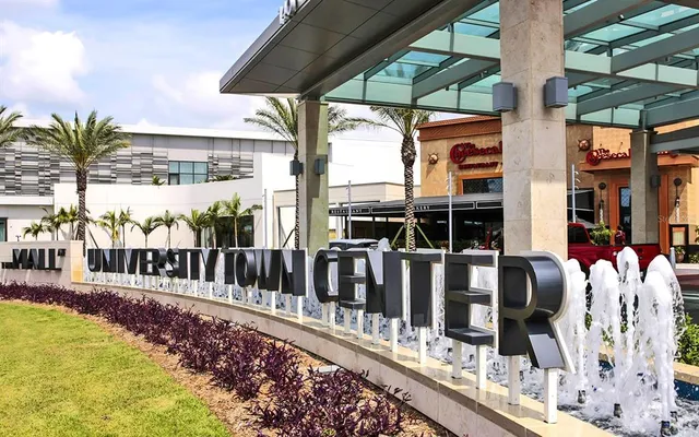 a view of a balcony with chairs
