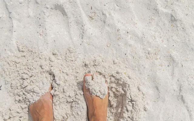 a close up of a white marble wall