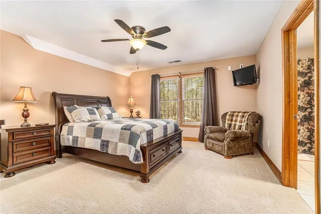 a living room with a rug and a rug