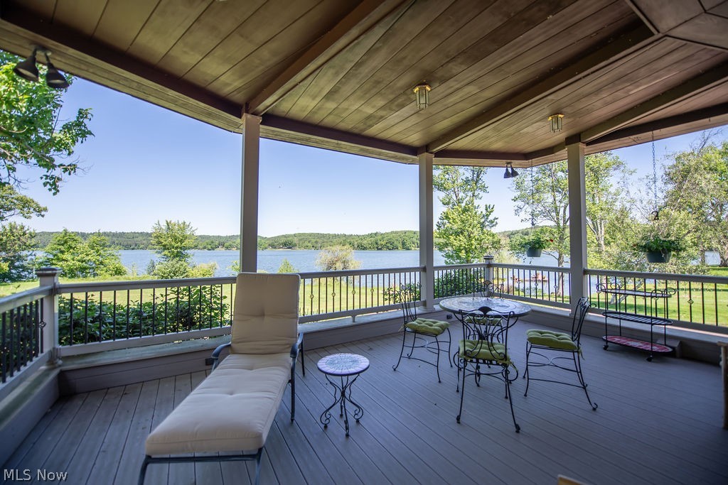 2009 Lakewood Road Southwest Sherrodsville, OH 44675 - Photo 8 of 47 Covered porch/ deck area with stunning lake views