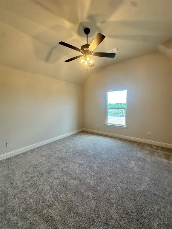 108 Blackstar Lane Decatur, TX 76234 - Photo 21 of 37 an empty room with windows and fan