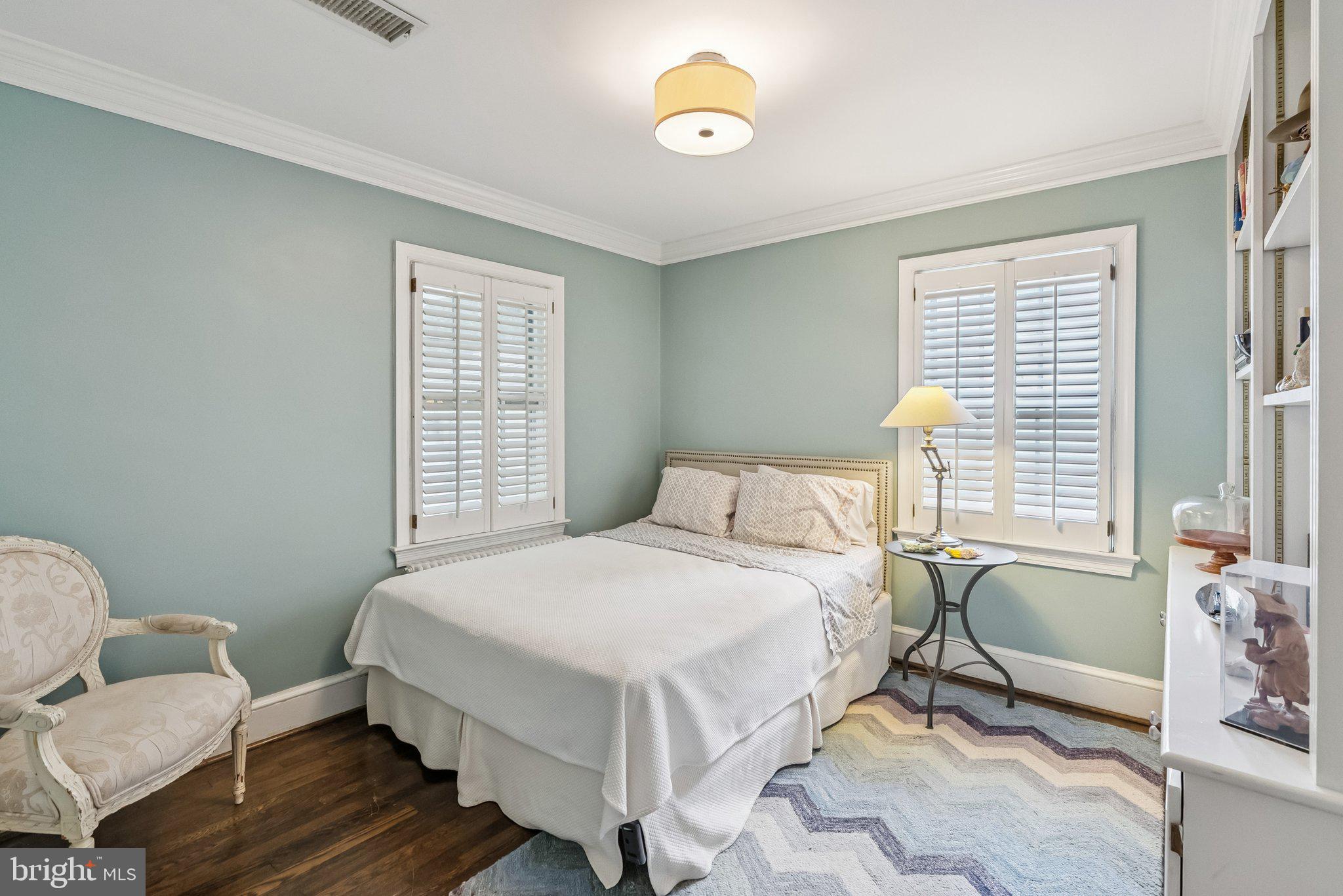 8109 Custer Road Bethesda, MD 20814 - Photo 18 of 54 a bedroom with a bed and a window