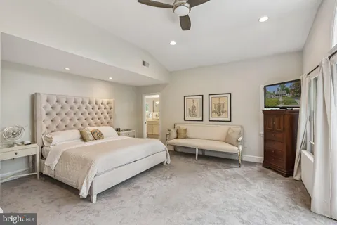 a bedroom with a bed and furniture