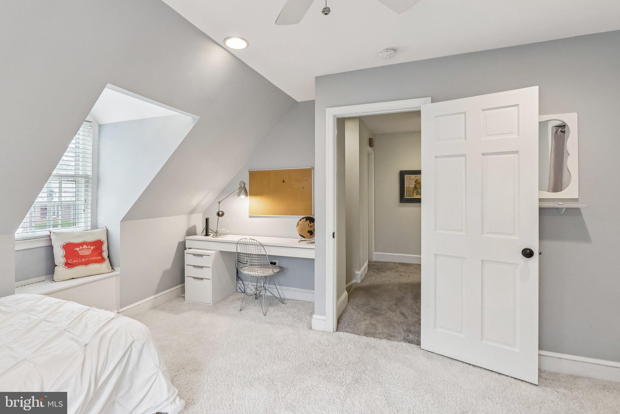 8109 Custer Road Bethesda, MD 20814 - Photo 34 of 54 a bedroom with a bed and a view of bathroom