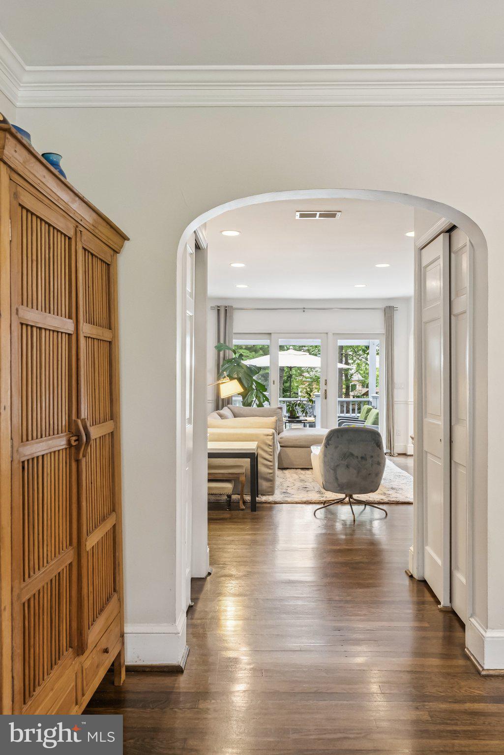 8109 Custer Road Bethesda, MD 20814 - Photo 8 of 54 a living room with furniture and a large window