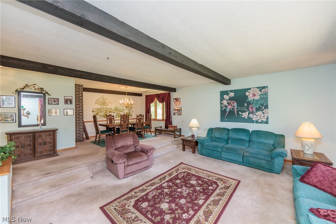 2170 Norton Road Stow, OH 44224 - Photo 24 of 48 Spacious interior featuring exposed ceiling beams and a multi-level design