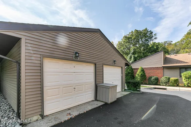 a view of a house with a garage