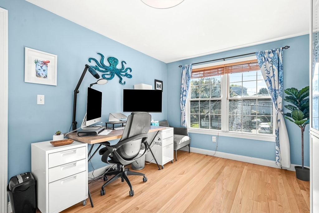 77 Warren Street, Unit A Arlington, MA 02474 - Photo 19 of 34 a view of a workspace with furniture and a window