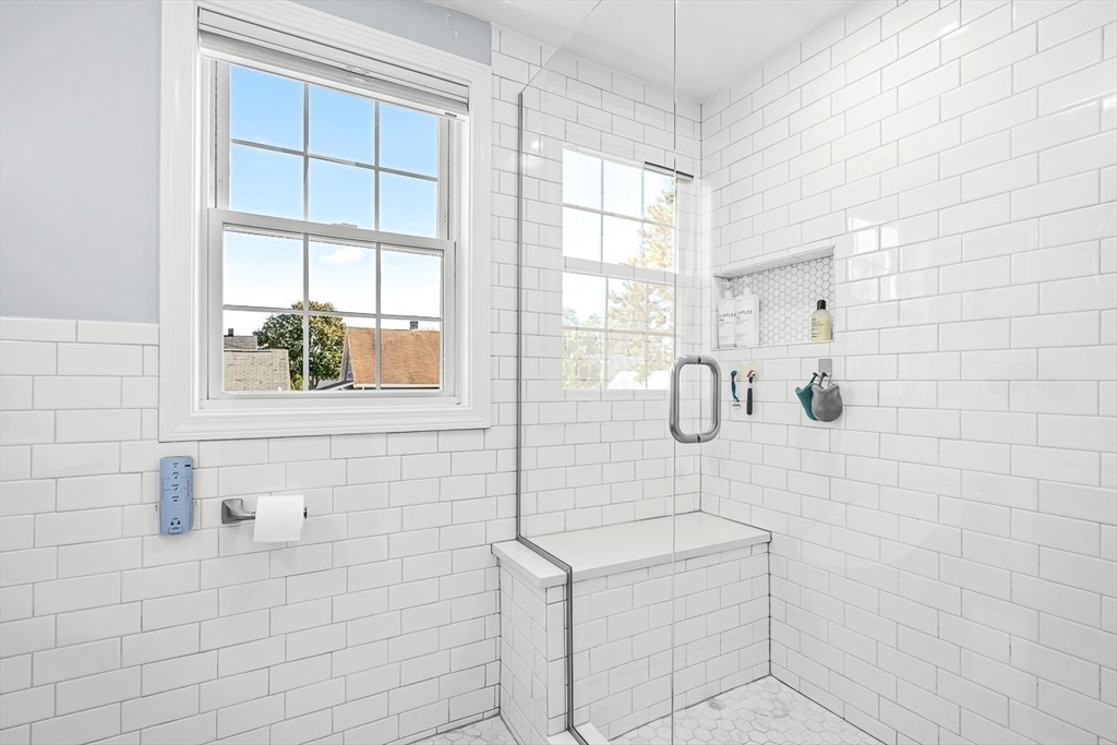 77 Warren Street, Unit A Arlington, MA 02474 - Photo 27 of 34 a bathroom with a shower