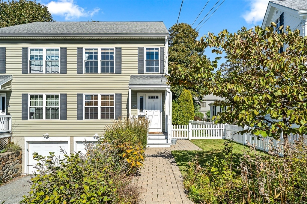 77 Warren Street, Unit A Arlington, MA 02474 - Photo 29 of 34 front view of a house
