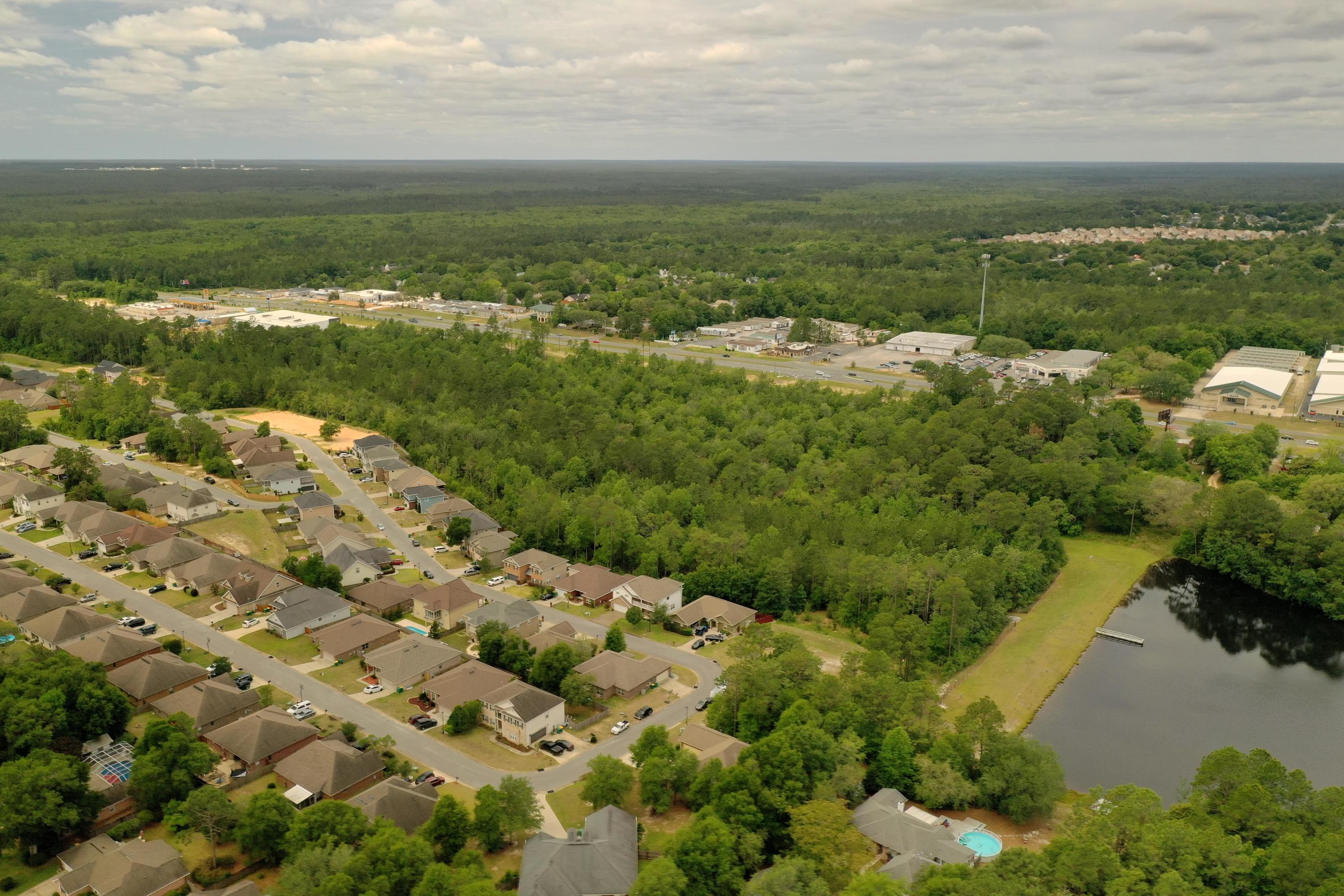 4566 Hermosa Road Crestview, FL 32539 - Photo 40 of 41 a view of a city with an ocean