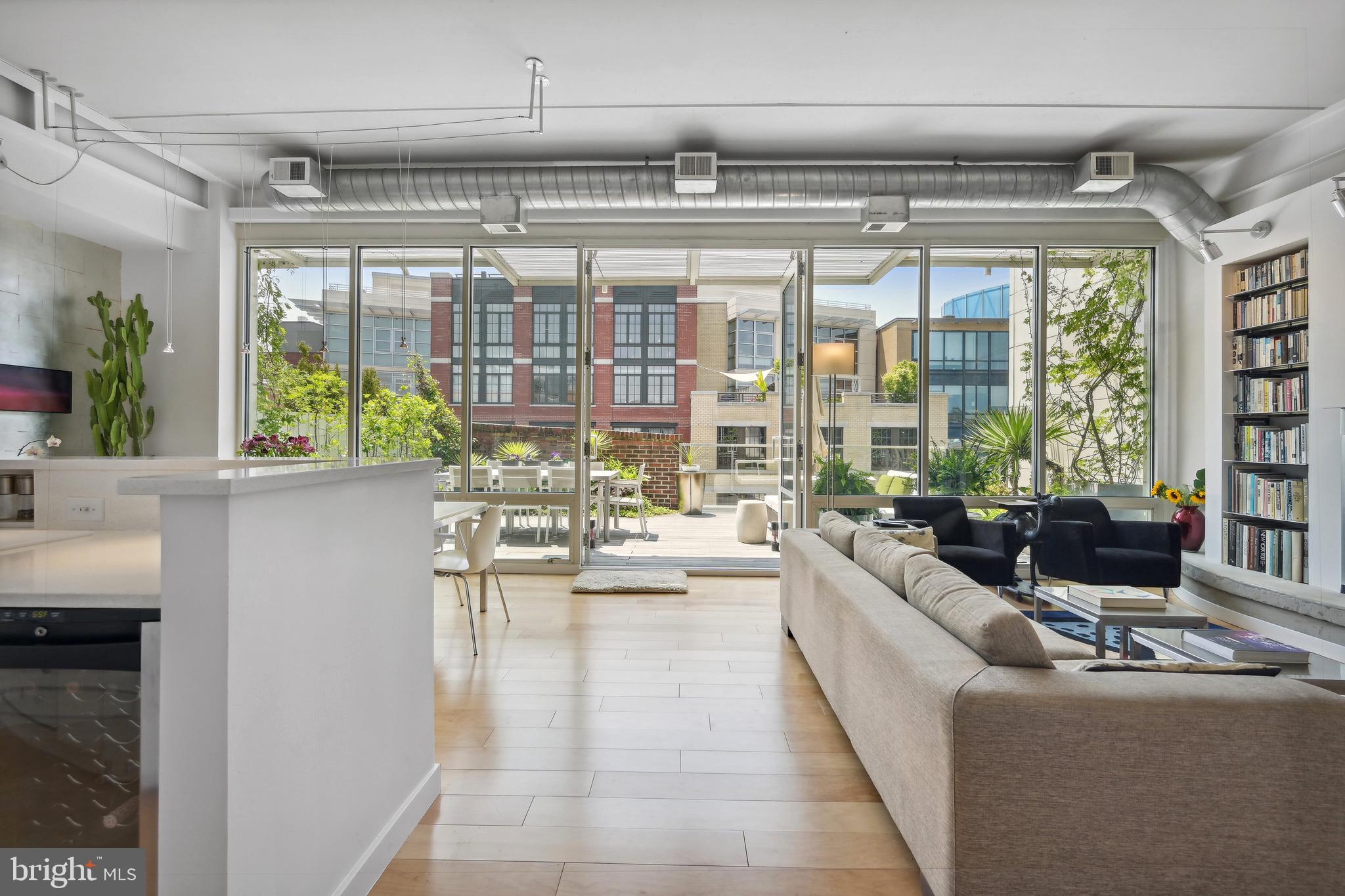 Dramatic Window Wall w/ 10’ 9” Ceilings