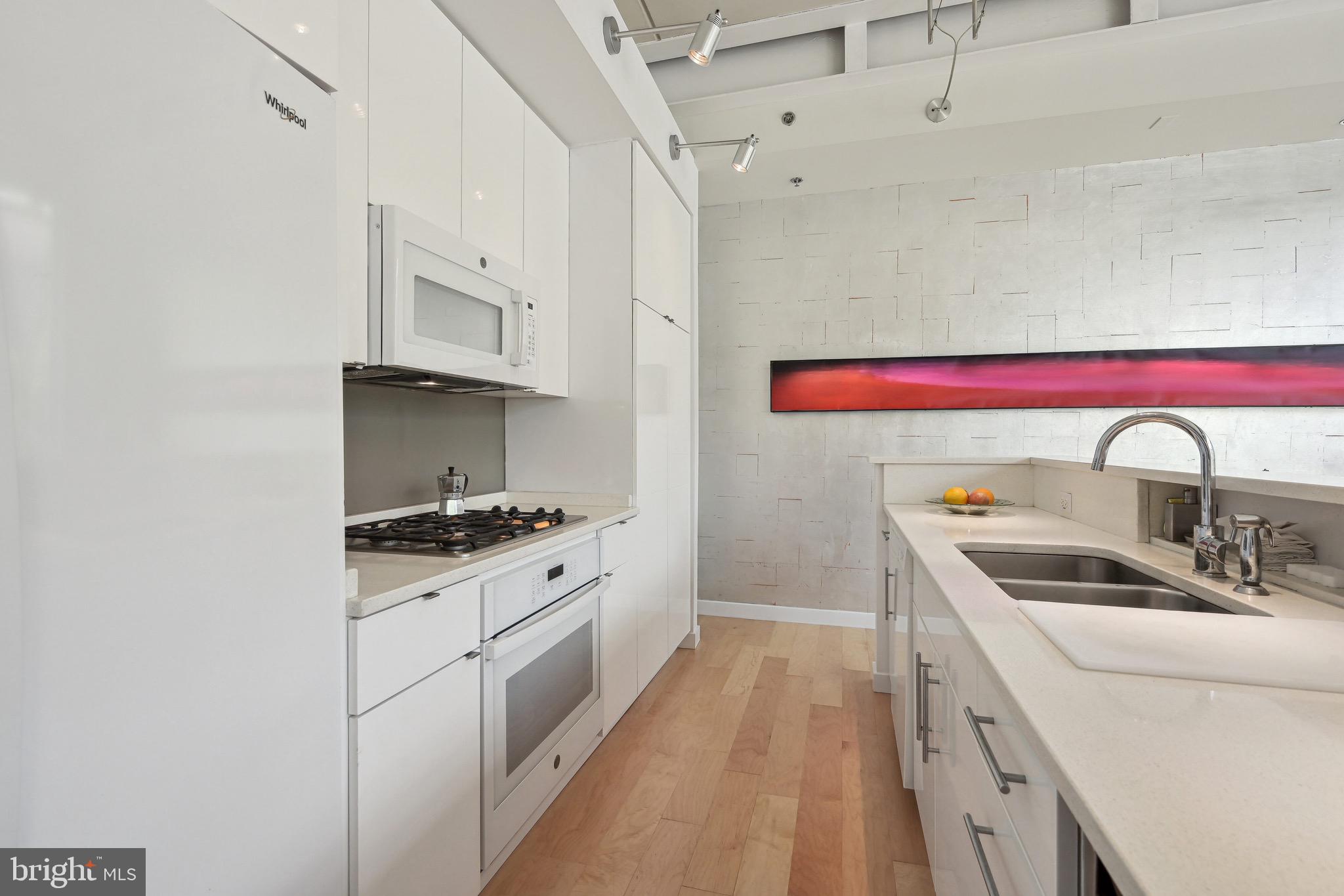 1445 Church Street Northwest, Unit 43 Washington, DC 20005 - Photo 8 of 30 Kitchen w/ Modern White Appliances