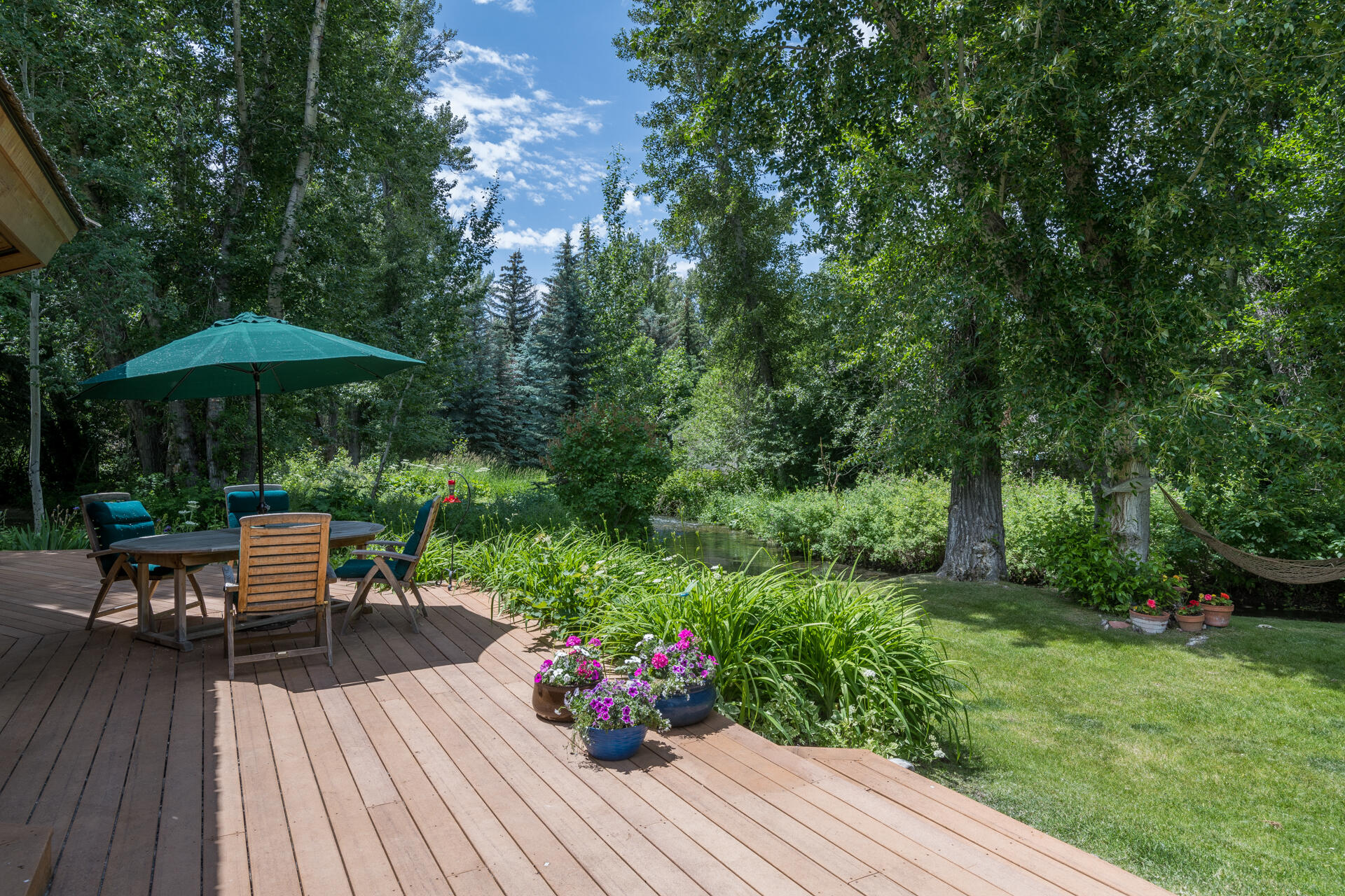 101 Willow Road Blaine County, ID 83333 - Photo 6 of 32 Summer living on the deck