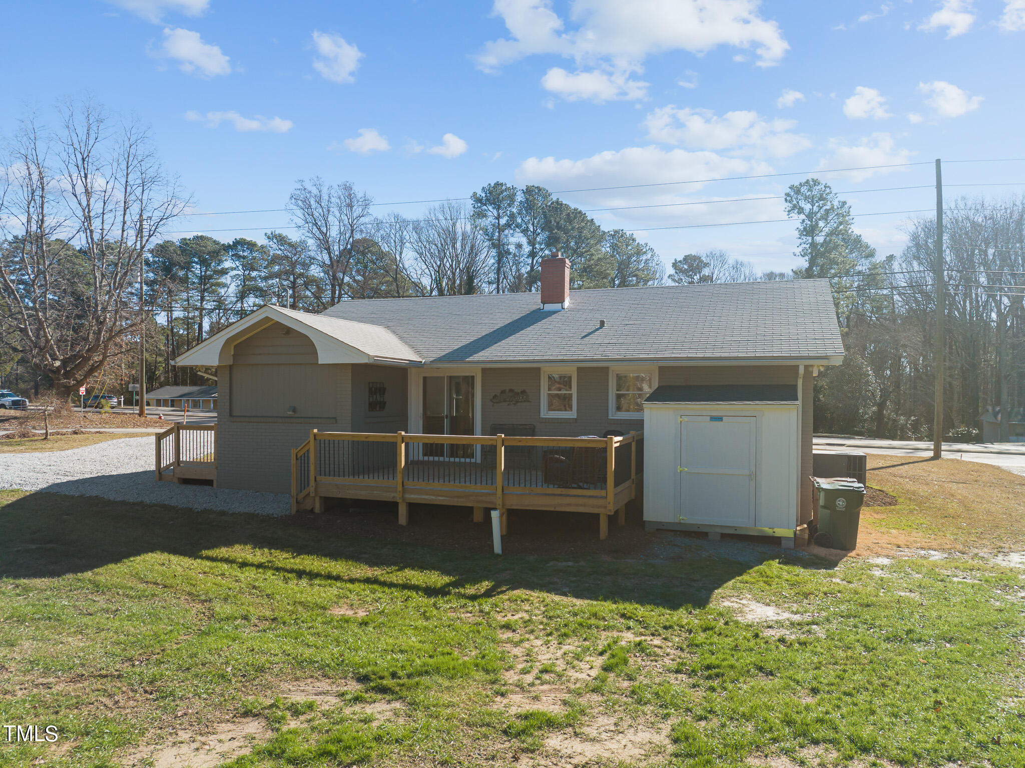 6320 Tryon Road Cary, NC 27518 - Photo 23 of 30 a view of a house with a yard