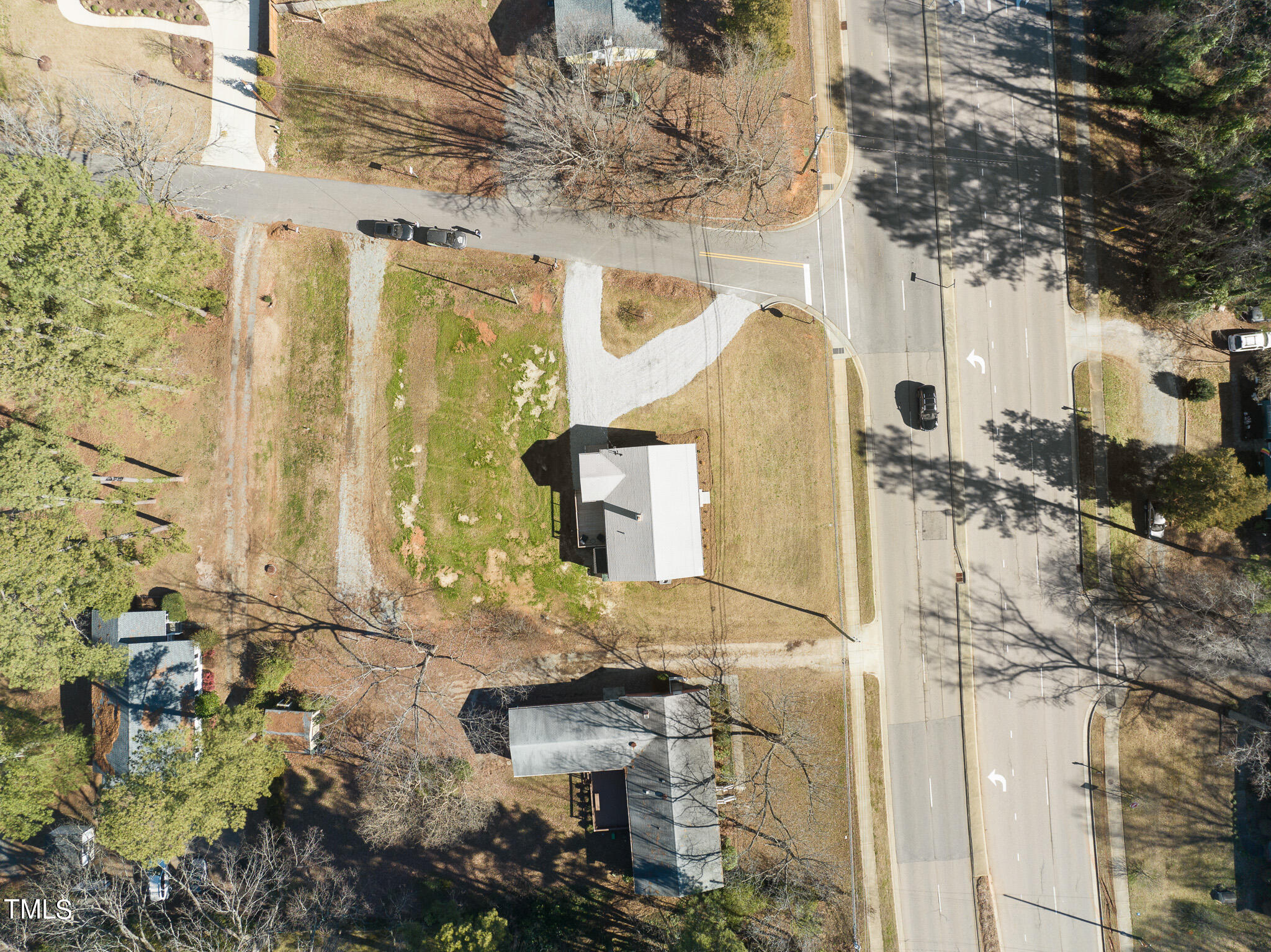 6320 Tryon Road Cary, NC 27518 - Photo 28 of 30 a front view of a house with a yard
