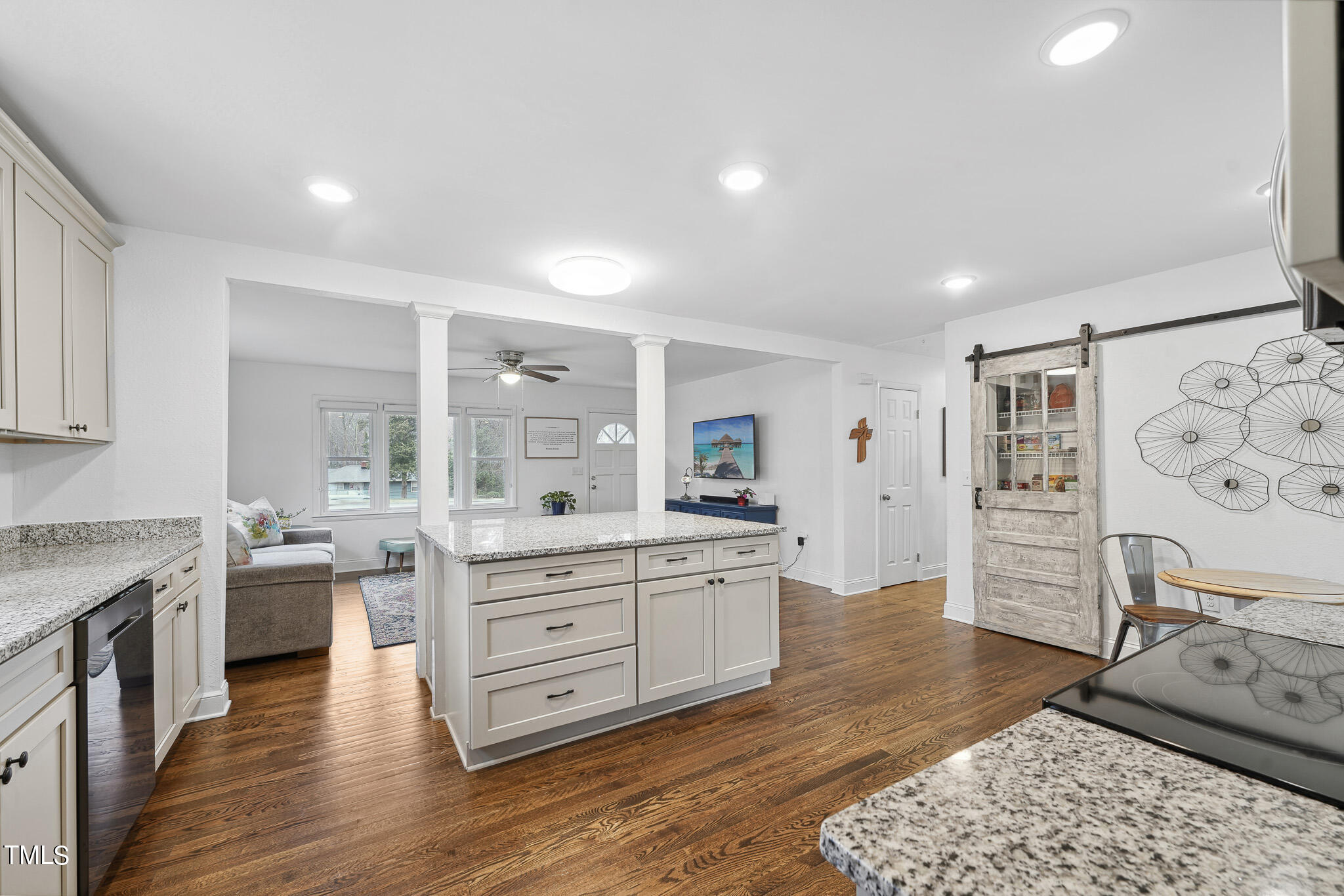 6320 Tryon Road Cary, NC 27518 - Photo 10 of 30 a large kitchen with stainless steel appliances granite countertop a stove and cabinets