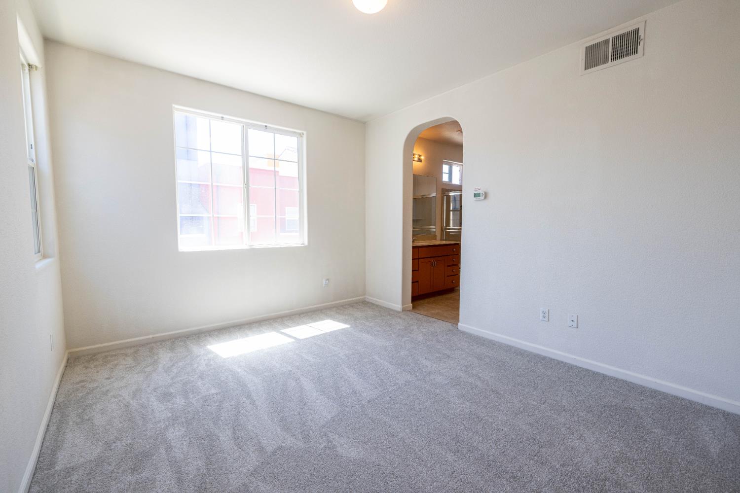 3122 Lea Sterling Way Rancho Cordova, CA 95670 - Photo 13 of 31 an empty room with windows