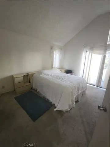 a bathroom with a sink a mirror and a toilet