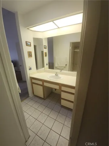 a view of a kitchen from the hallway