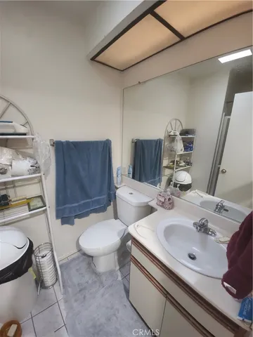 a bed room with furniture and a window