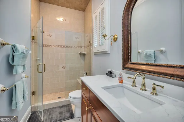 a view of room with window and wooden floor