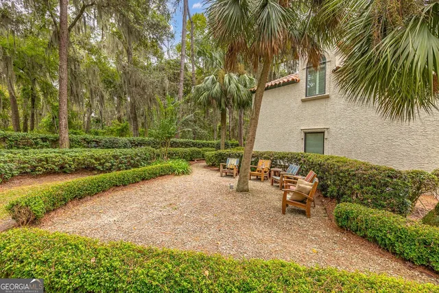 a view of back yard with swimming pool