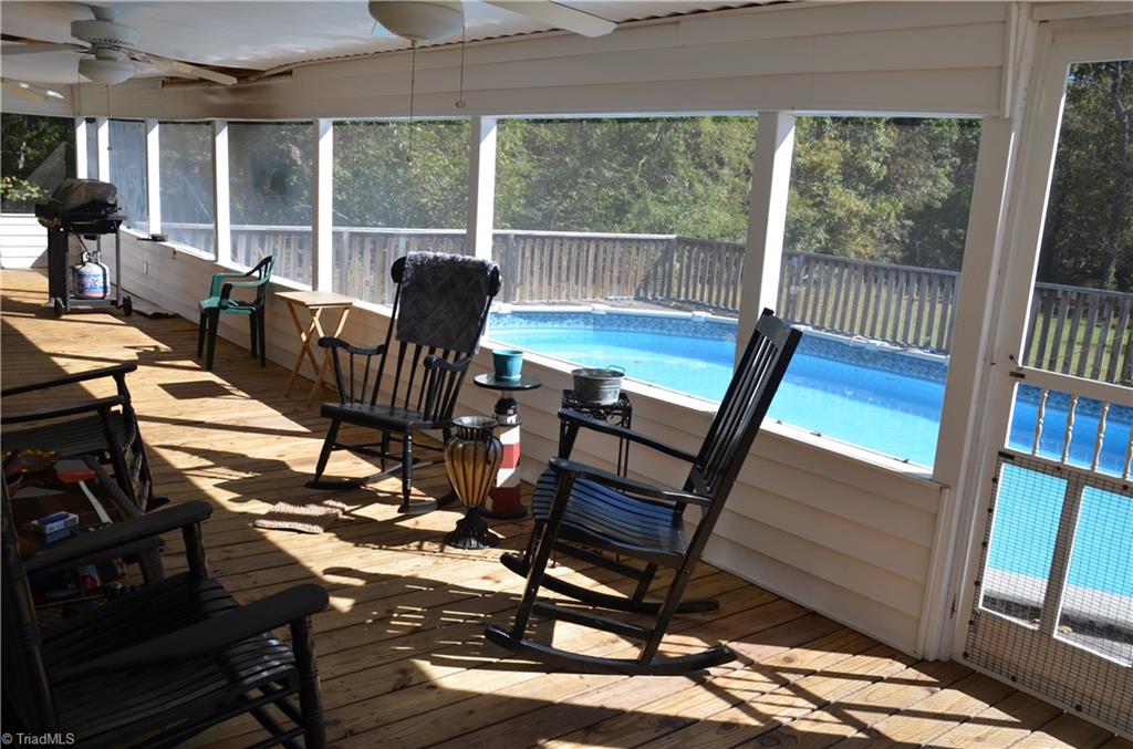 1631 Sexton Road Denton, NC 27239 - Photo 3 of 15 Screened in Porch has 3 Ceiling Fans!