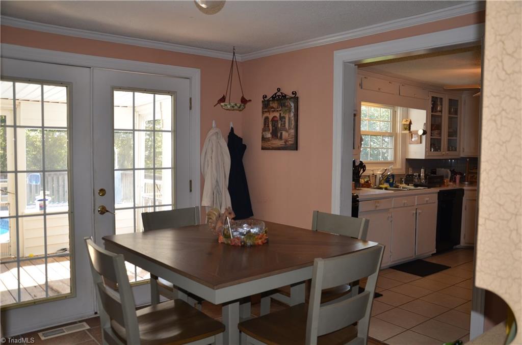 1631 Sexton Road Denton, NC 27239 - Photo 6 of 15 Wonderful Breakfast Nook leading out to screened in porch + pool!