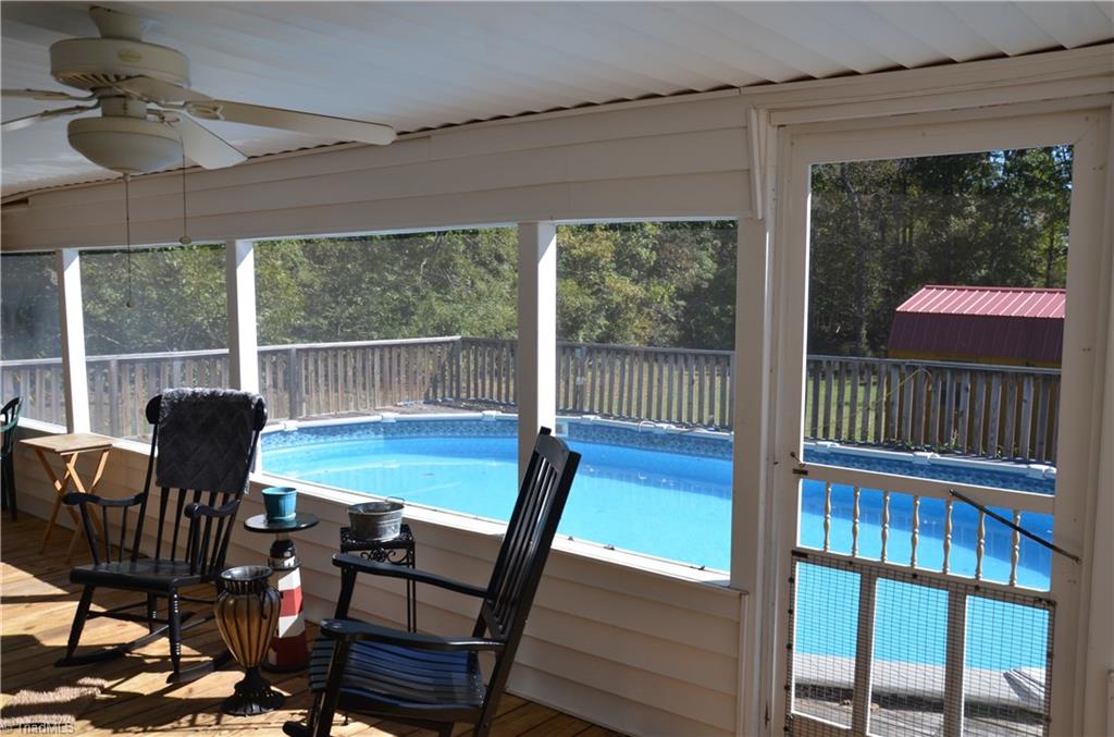 1631 Sexton Road Denton, NC 27239 - Photo 7 of 15 HUGE Screened in Porch leading out to fantastic pool area...