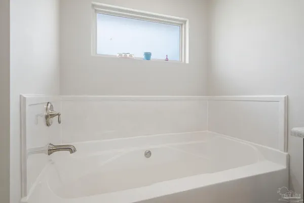 a close up of a bathtub in a bathroom