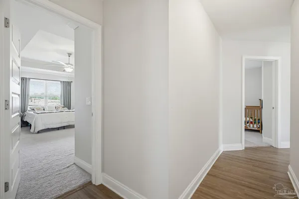 a view of a bedroom from a hallway