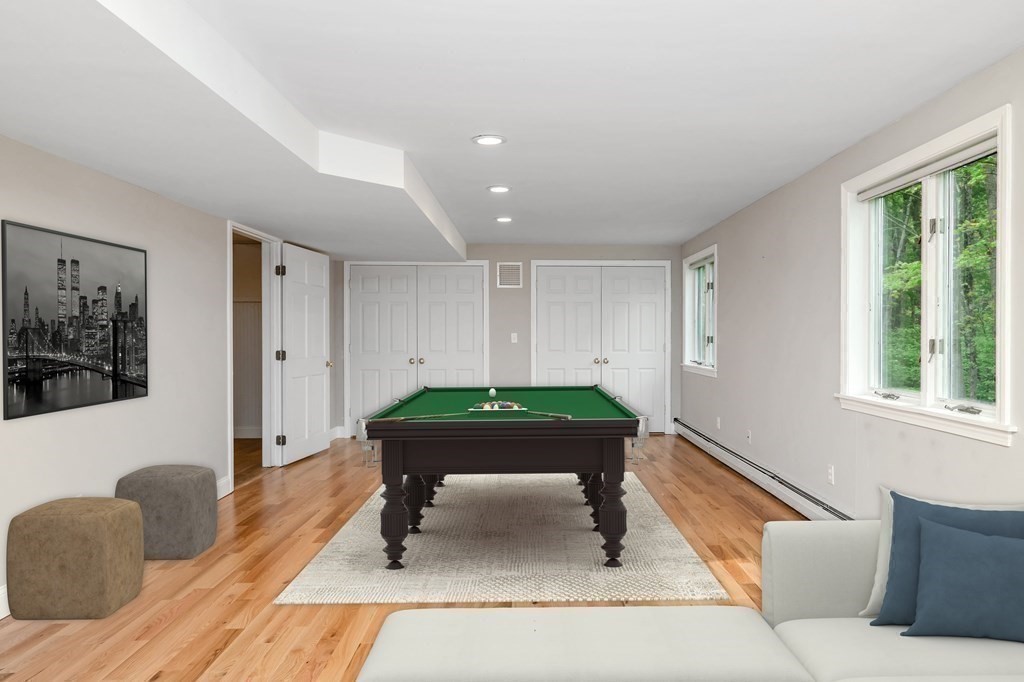 149 Pleasant Valley Road Amesbury, MA 01913 - Photo 16 of 42 a room with furniture and a window
