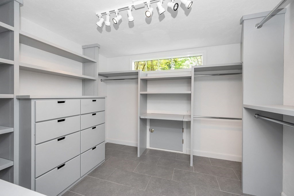 149 Pleasant Valley Road Amesbury, MA 01913 - Photo 25 of 42 a view of an empty walk in closet