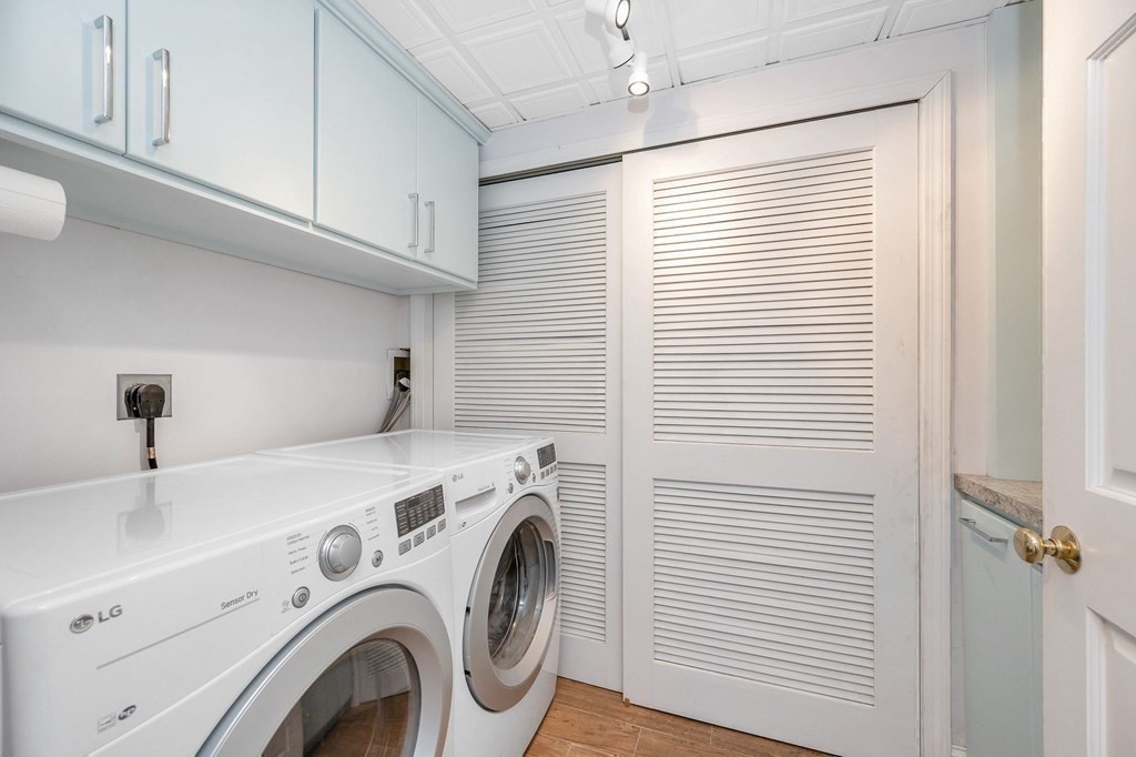 149 Pleasant Valley Road Amesbury, MA 01913 - Photo 34 of 42 a utility room with dryer and washer
