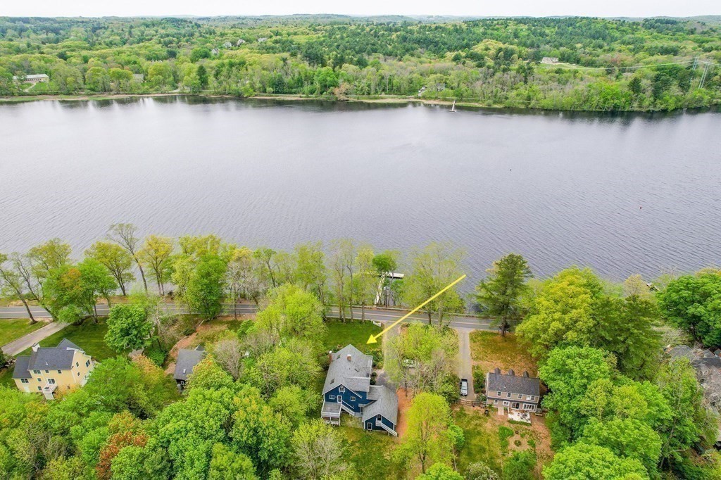149 Pleasant Valley Road Amesbury, MA 01913 - Photo 4 of 42 an aerial view of a residential houses with outdoor space and trees