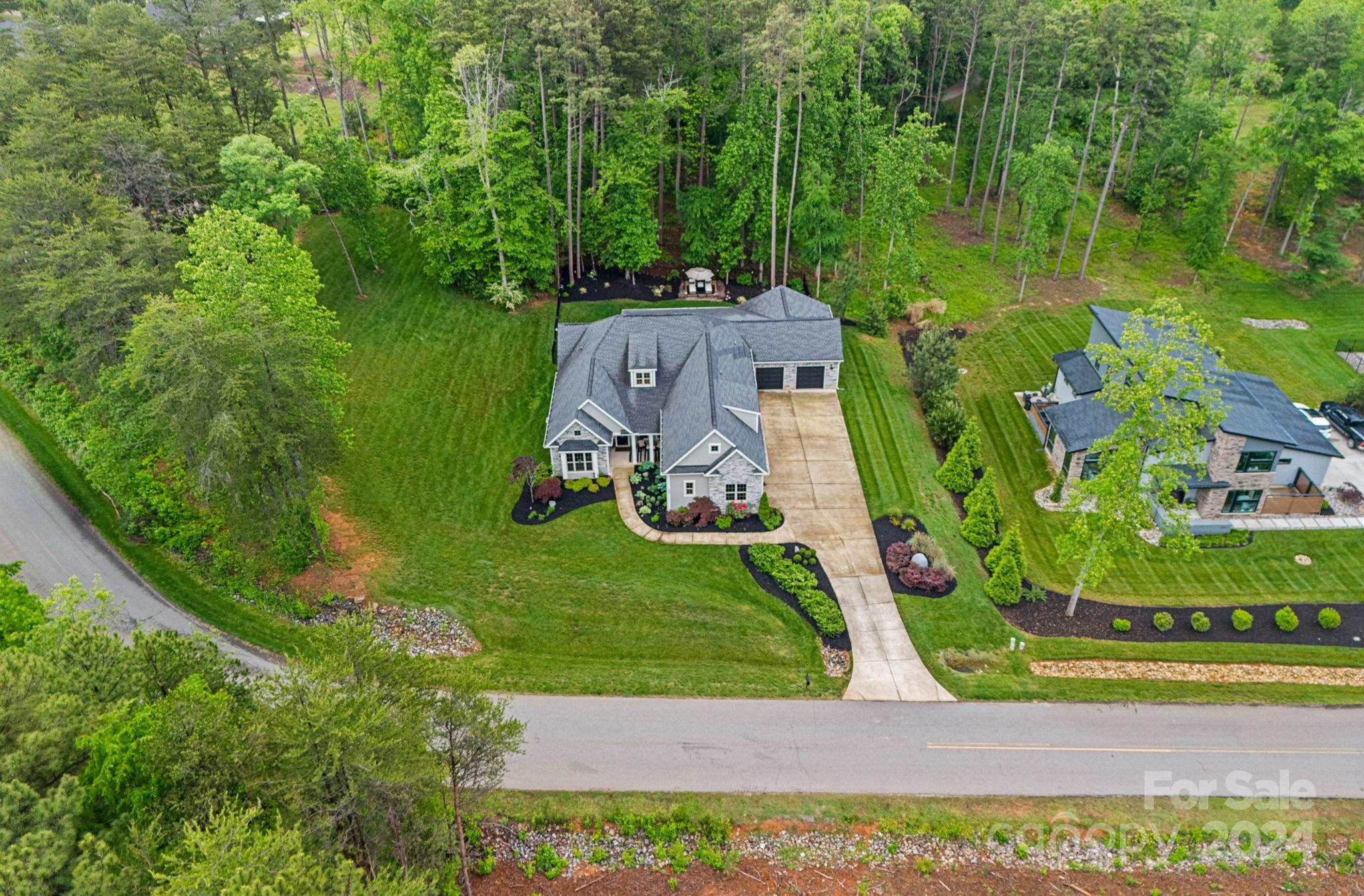 203 Webbed Foot Road Mooresville, NC 28117 - Photo 30 of 34 a view of a garden with plants