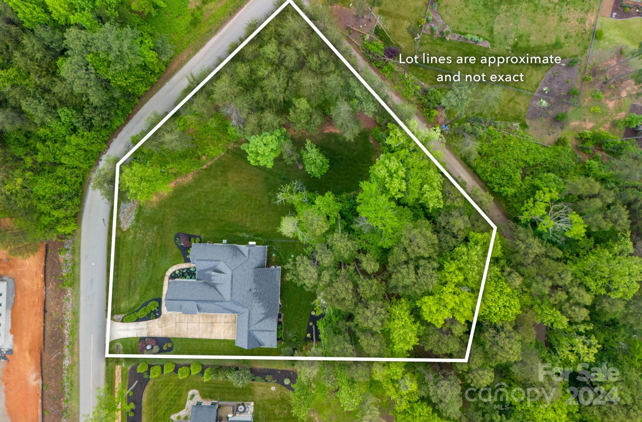 203 Webbed Foot Road Mooresville, NC 28117 - Photo 34 of 34 an aerial view of a residential houses with yard