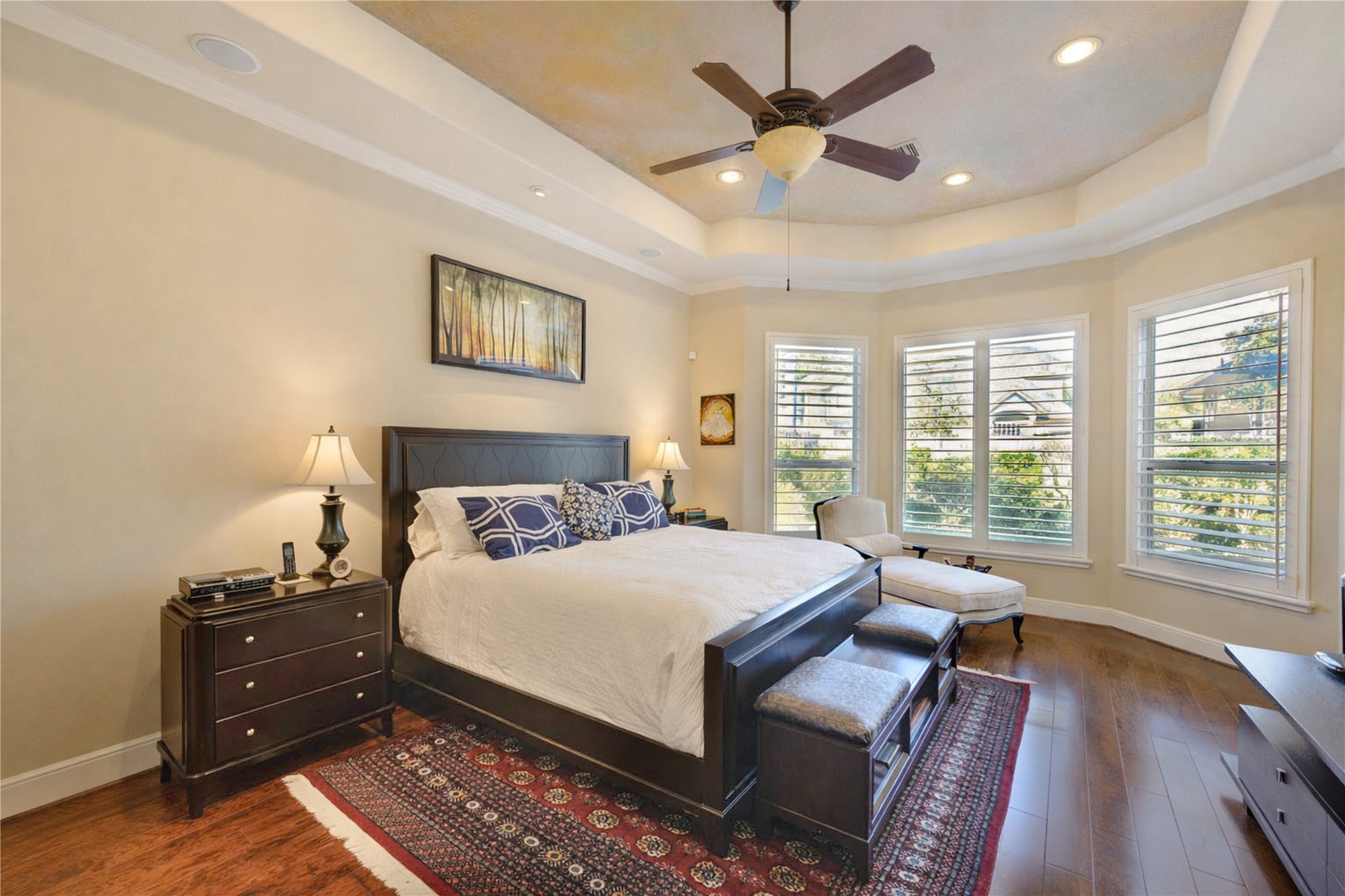 16618 Victoria Falls Lane Spring, TX 77379 - Photo 16 of 49 This exquisite master ensuite features a beautifully designed wine cellar with custom wood shelving and elegant wrought iron details, creating a luxurious retreat for relaxation and entertainment.