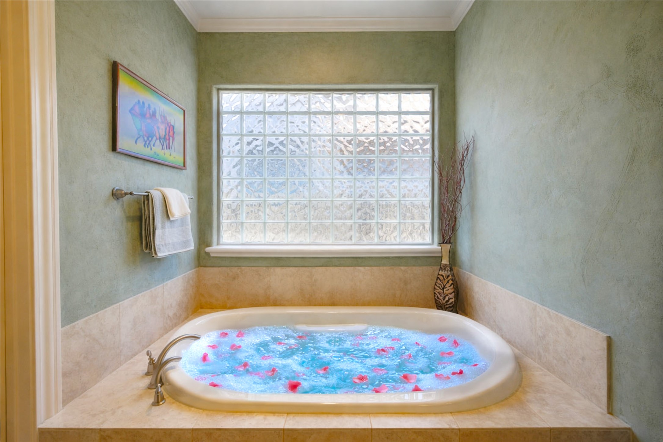 16618 Victoria Falls Lane Spring, TX 77379 - Photo 18 of 49 Luxurious master bath featuring a serene soaking tub under natural light, perfect for relaxation.