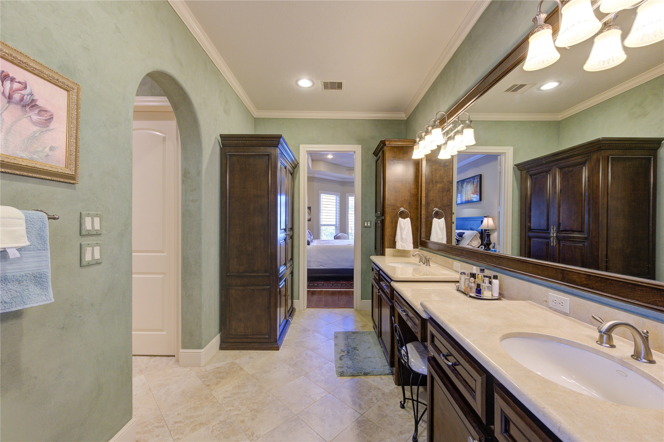 16618 Victoria Falls Lane Spring, TX 77379 - Photo 20 of 49 This elegant space combines a sleek kitchen with modern appliances and abundant cabinetry, seamlessly incorporating a laundry area for ultimate convenience and efficiency.