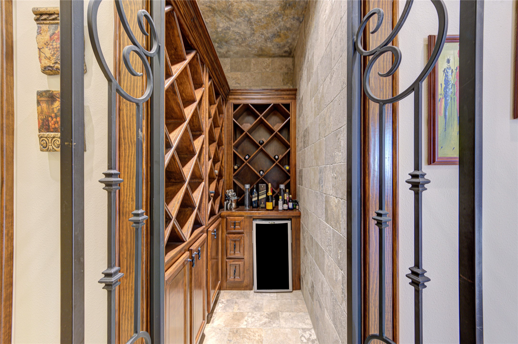 16618 Victoria Falls Lane Spring, TX 77379 - Photo 26 of 49 Charming wine grotto with an ornate wrought iron gate.