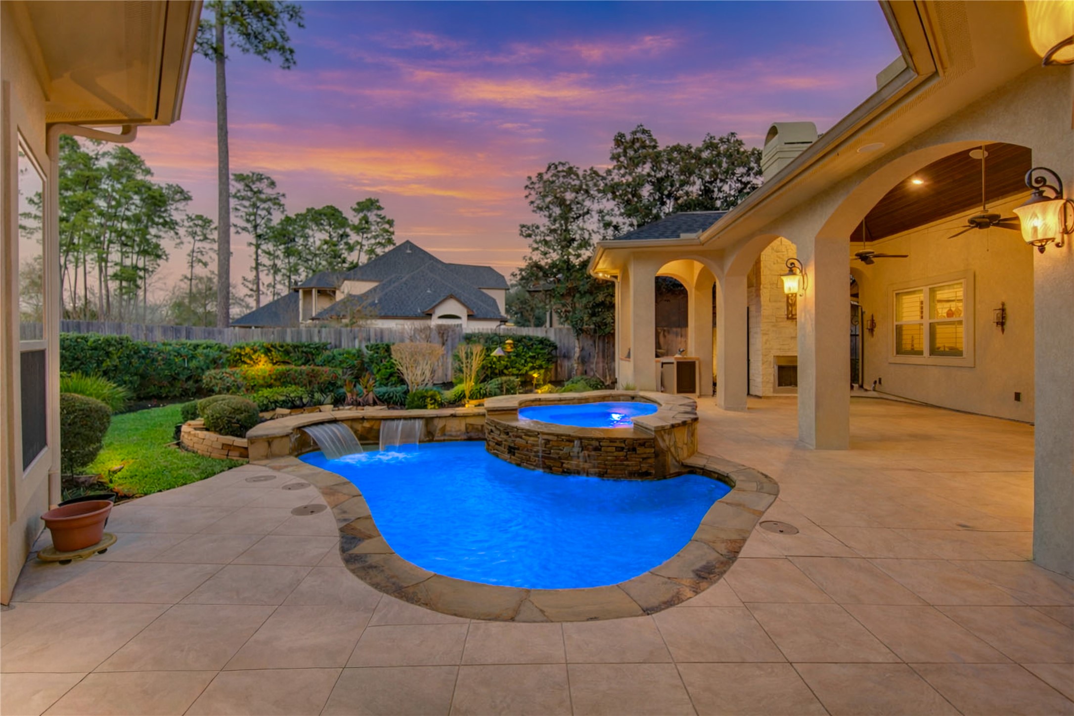 16618 Victoria Falls Lane Spring, TX 77379 - Photo 3 of 49 This inviting home features a low maintenance plunge pool with hot tub. Lots of room to entertain.